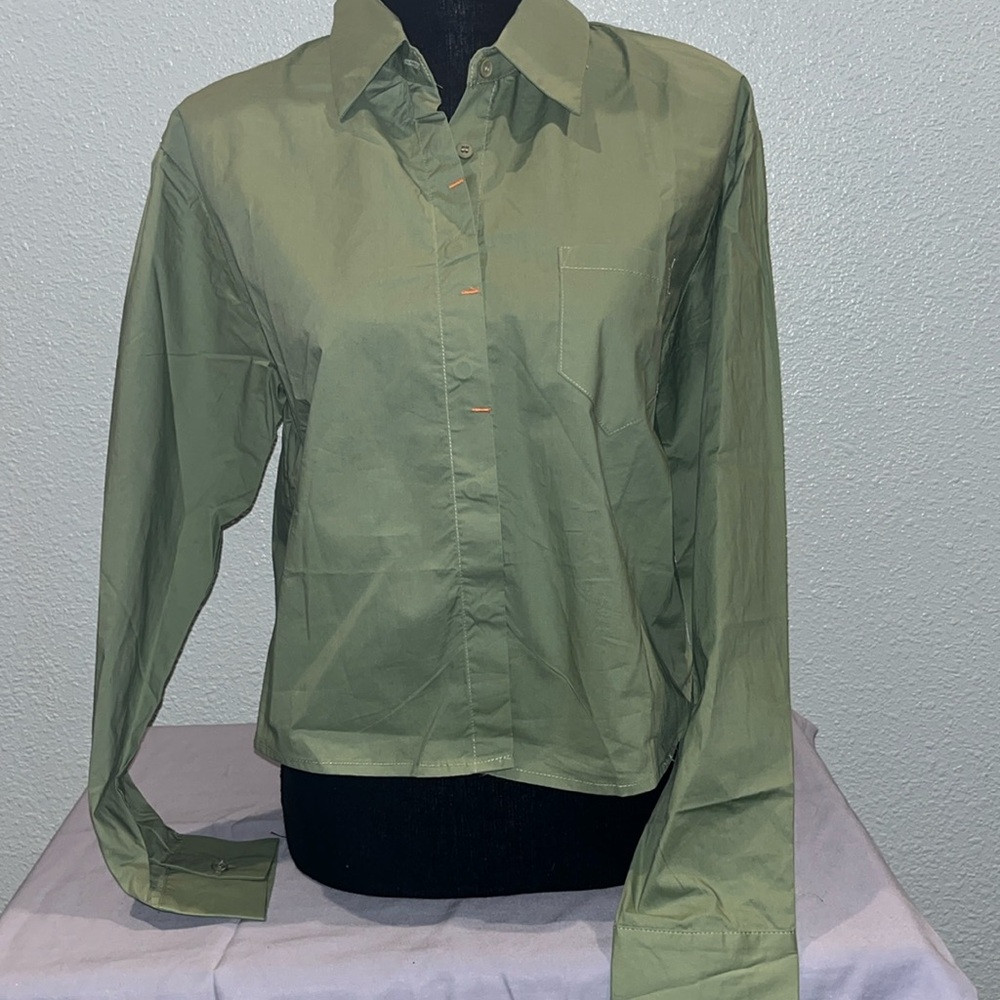 Love the color made by know one cares size medium great addition to wardrobe